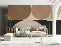 An artistic harmonious circle mural on minimalist wallpaper.

