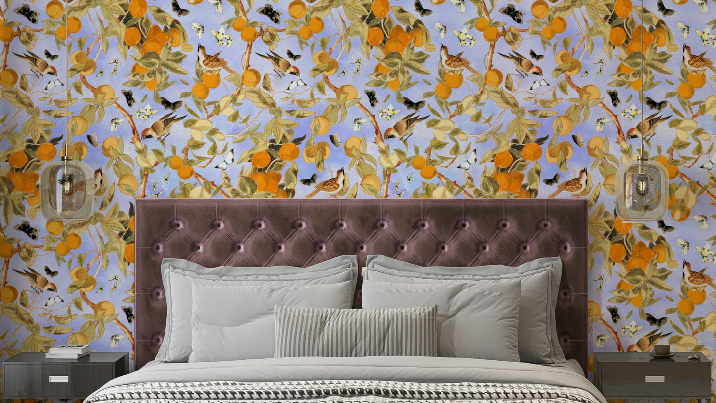 Cheerful wall mural with oranges, lemons, and soft botanical details.

