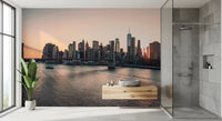 City Lights at Dawn wall mural of the dawn skyline behind a stone vessel sink and walk-in shower in a bathroom