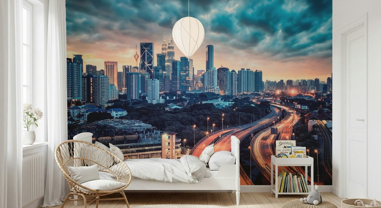 Cityscape Dawn wallpaper mural of the dusk city skyline above a white bed and rattan chair in a bedroom