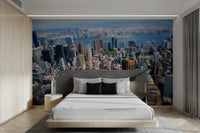 Features a cityscape with buildings and structures.
