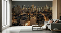 Cityscape Twilight wallpaper mural of a glowing city skyline behind a grey sofa in a living room