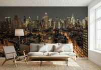 Cityscape Twilight wallpaper mural of a city skyline behind a white sofa and woven chair in a living room