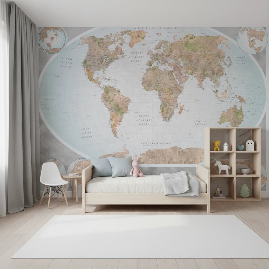 Classic world map in blue and earthy tones wallpaper mural behind a wood daybed and white Eames chair in a kids room