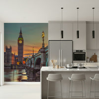 Clock tower wallpaper mural of Big Ben at sunset in a grey kitchen with a marble island and bar stools