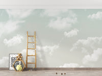 Nursery interior showcasing the serene atmosphere created by the sky mural.