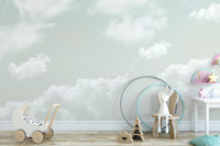 Detail shot of soft white and pale blue hues in the floating clouds wallcovering.