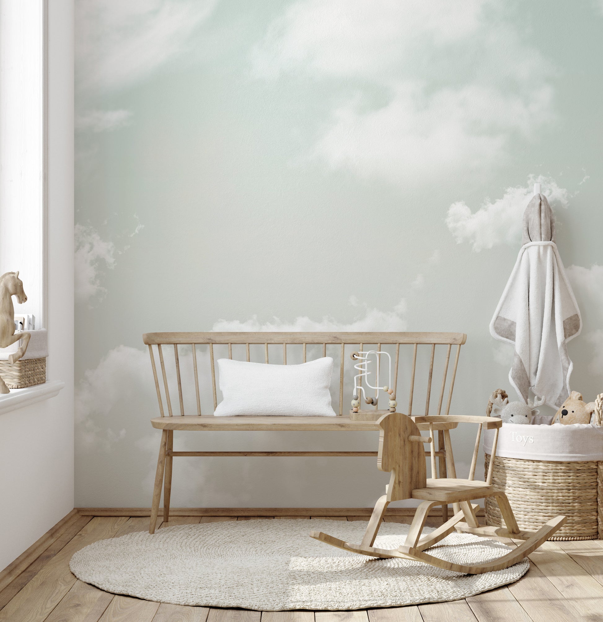 Full view of a living room wall featuring the elegant cloud design mural.