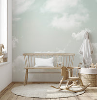Full view of a living room wall featuring the elegant cloud design mural.