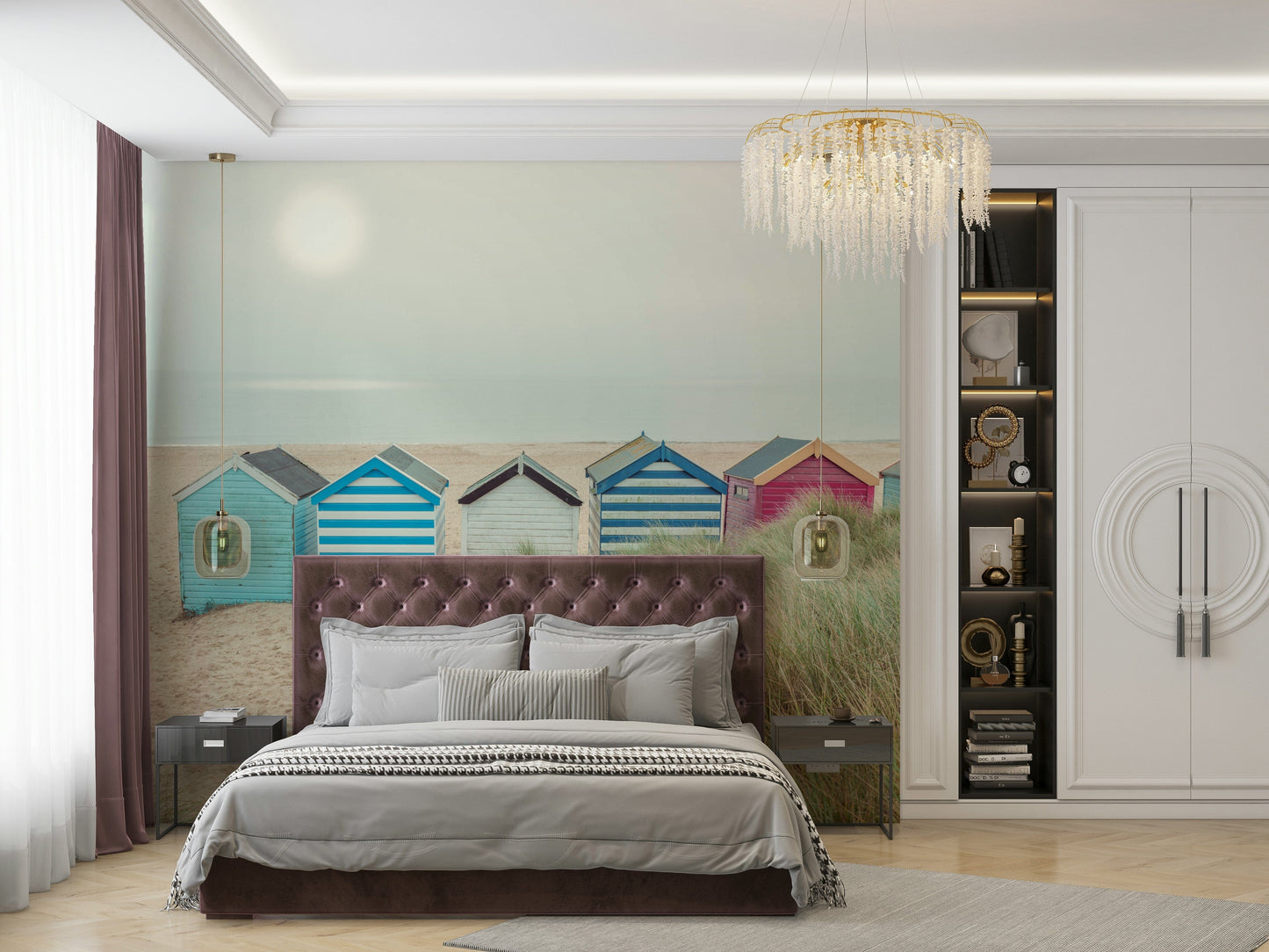 A beautiful row of colorful beach huts on a sandy beach under a blue sky.

