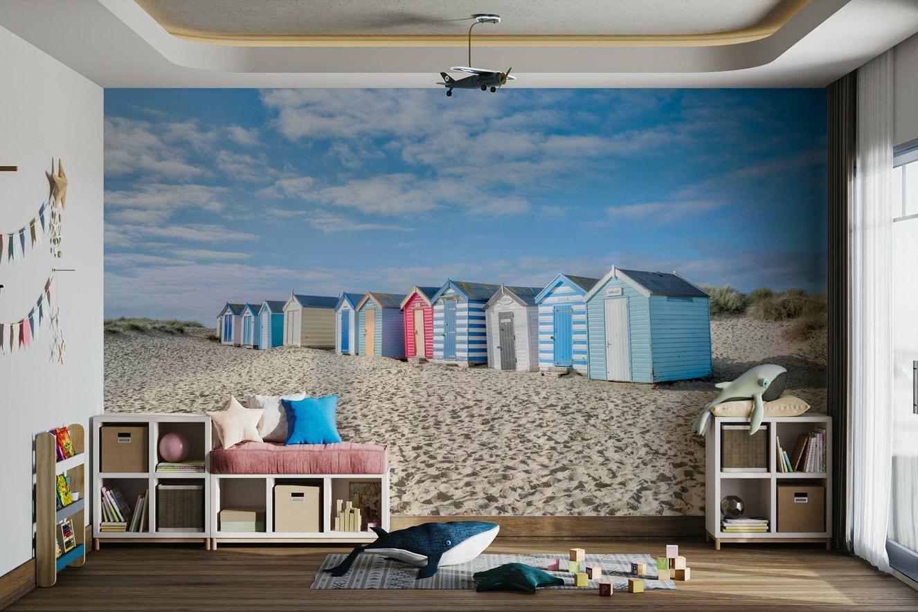 A living room featuring the coastal wall mural.

