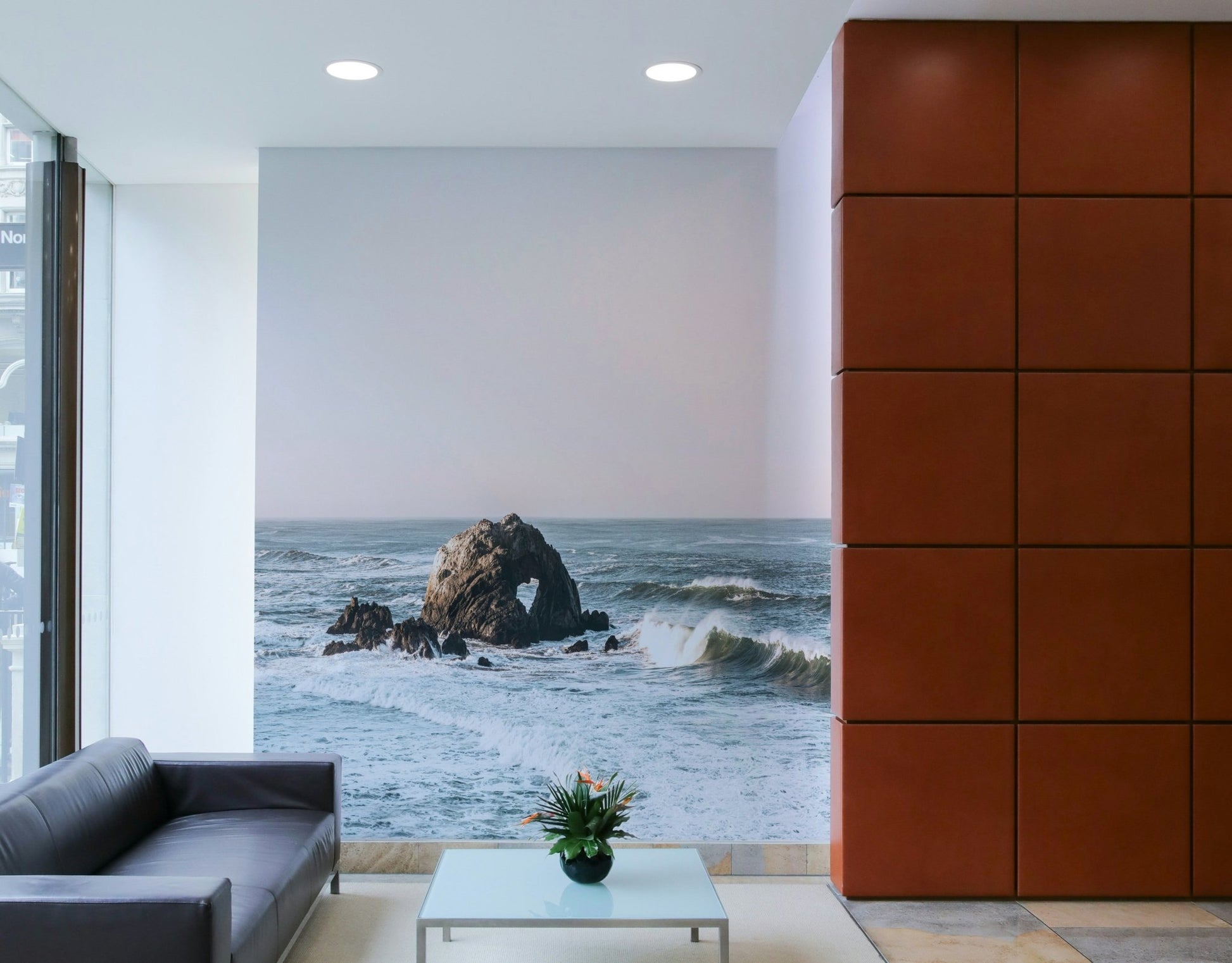 Ocean waves and coastal elements in the Coastal Heart mural.

