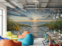 Coastal Path Serenity wall mural of a beach path at sunset behind colorful bean bags and laptop desks in an office