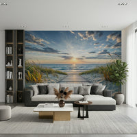 Coastal Path Serenity wall mural of a boardwalk to the sea at sunset behind a grey sectional sofa and black bookshelf