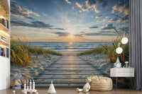Coastal Path Serenity wall mural of a sunrise beach boardwalk behind a white bed and rattan chair in a kids bedroom