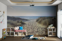 Peaceful beach path leading to the ocean captured in a wall mural.

