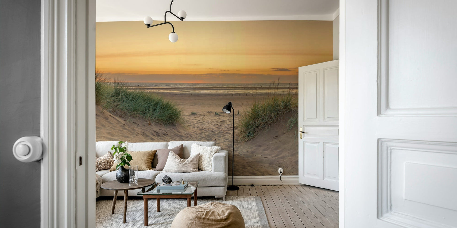 Wall mural showing calm coast with golden hour lighting.

