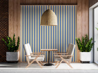 Blue and off-white vertical stripe wallpaper for a modern nautical aesthetic.