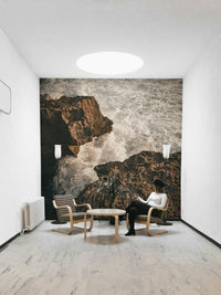 A minimalist interior with the ocean-themed wallpaper.

