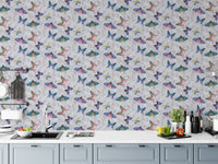 Kitchen room with a colorful butterfly pattern wallpaper mural using peel and stick fabric for a clean, bright look.