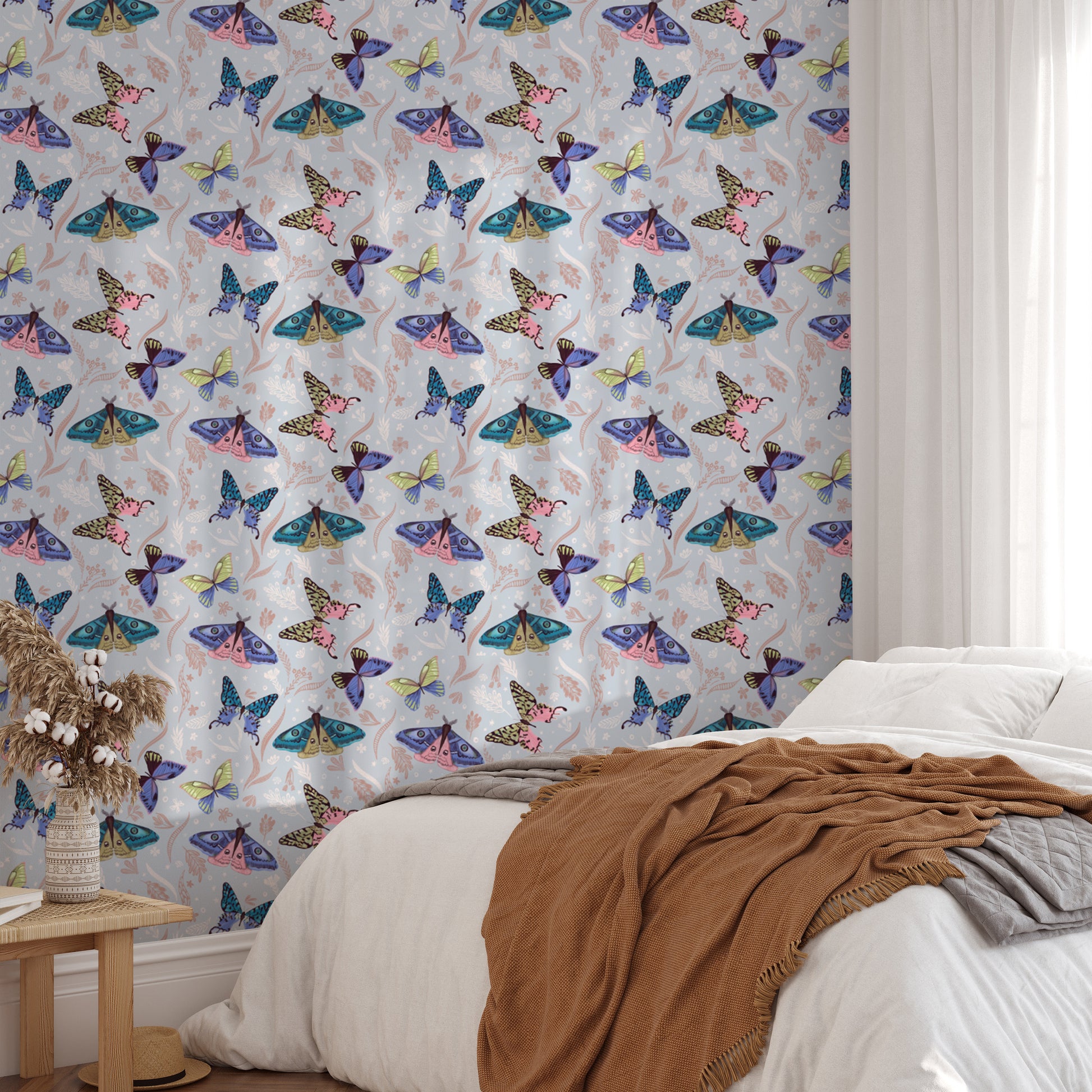 Colorful butterfly pattern wallpaper mural in a bedroom with peel and stick material for a vibrant, easy update.
