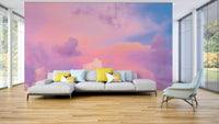 Gentle mural wallpaper with pink and orange hues

