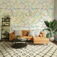 Modern wall mural with geometric lines in a minimalist master suite.