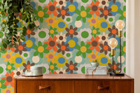 Colorful mural of flowers in orange green and blue
