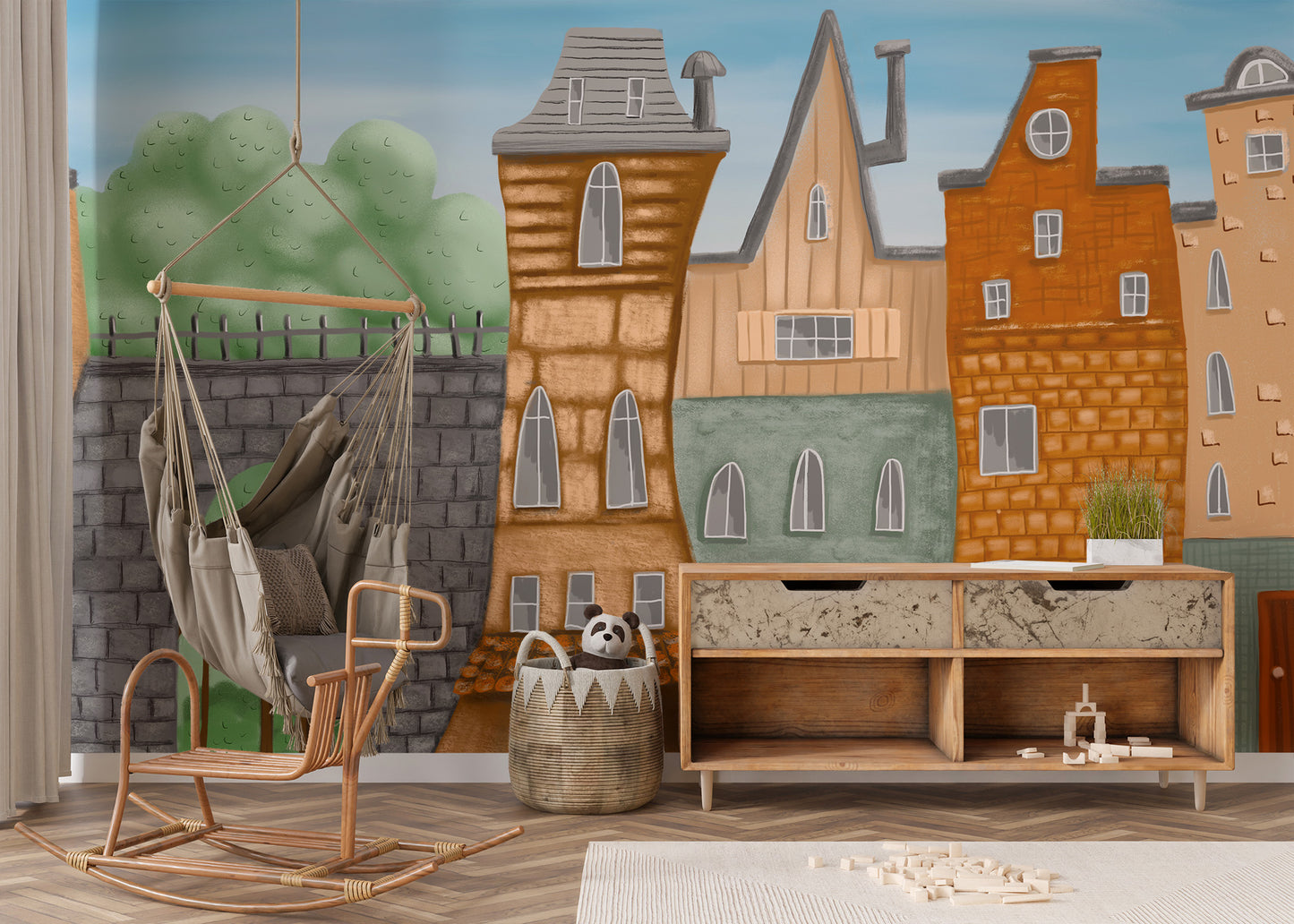Small Painted City wallpaper mural behind a rattan hammock chair and toy console in a child's room