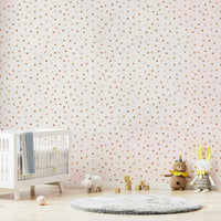 Boho kids’ room with confetti forest mural wallpaper

