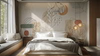 Contour Elegance Artwork Series wallpaper mural of beige line-art faces and leaves behind a white bed in a sunlit bedroom