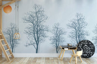 Elegant tree contours mural with a striking red sun accent.
