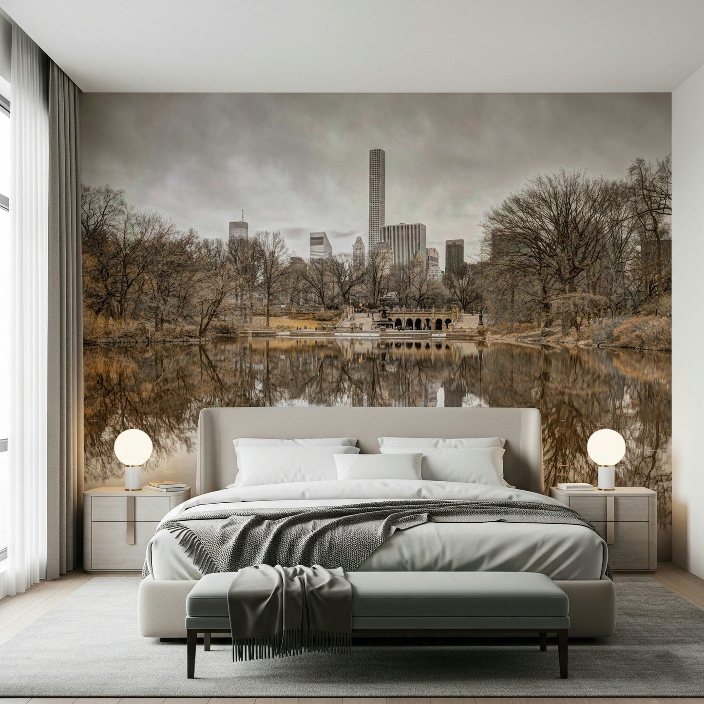 Contrast of Worlds mural over an upholstered bed with two round globe lamps and a bench in a calm bedroom
