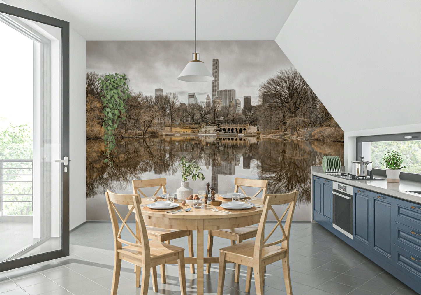 Contrast of Worlds mural in a kitchen dining nook with a light wood round table and X-back chairs