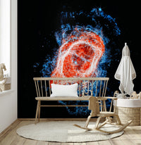 Cosmic Bloom wall mural of a fiery ring nebula behind a wood spindle bench and rocking chair in a nursery