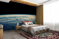 The colors are soft, muted tones of blue, purple, and black.

