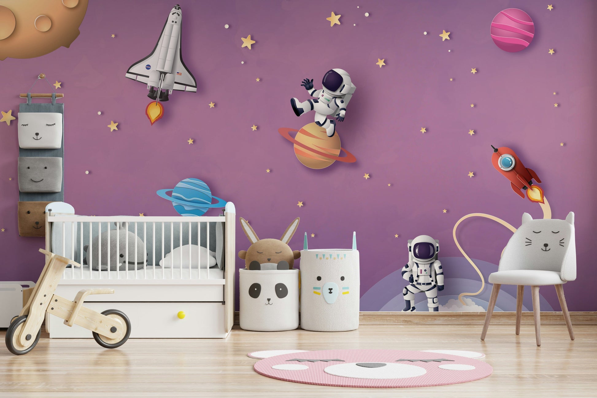 The design features a group of friendly, cosmic characters.

