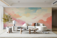 Light airy sky design on a large accent wall in a studio apartment.