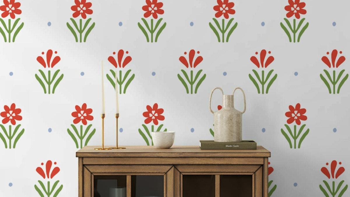 Red flower print wallpaper with green stems

