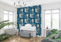 Rustic Western wallpaper showcasing cowboy imagery including boots, guns, and desert motifs.