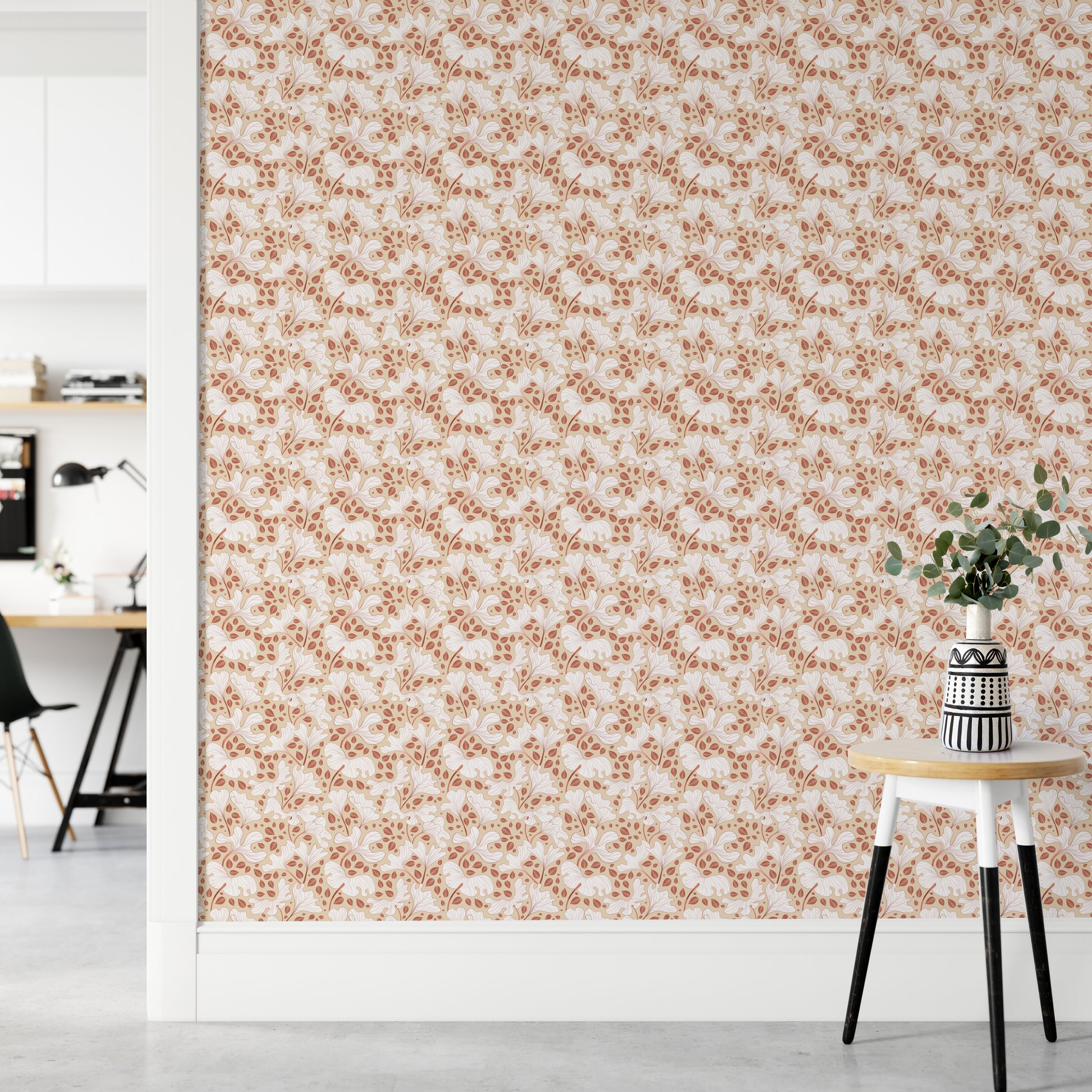 Minimalist foliage wallpaper in warm cream tones


