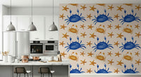 Coastal-themed mural featuring friendly crabs and simple star icons.