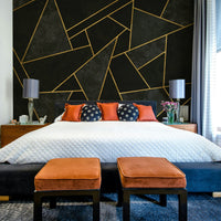 Artistic black mosaic mural creating a striking focal point

