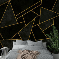 Luxurious black mosaic mural with intricate, cracked design

