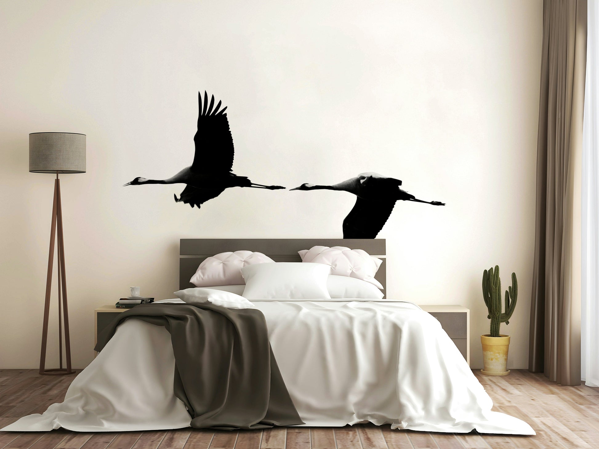An artistic flying crane mural on minimalist wallpaper.

