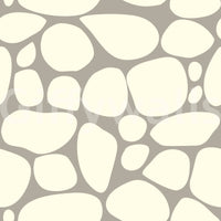 Decorative Pebble Beach wall art irregular white pebble arrangement.