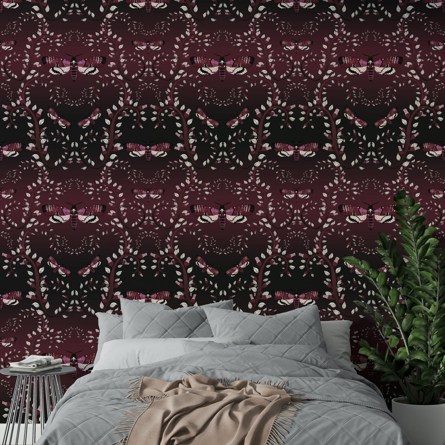Dark floral wallpaper with crimson insect accents

