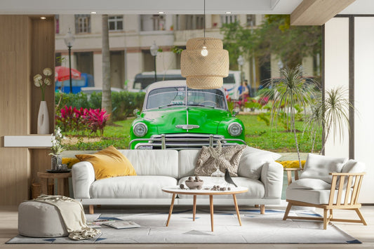 A wall mural of a classic Cuban street scene.

