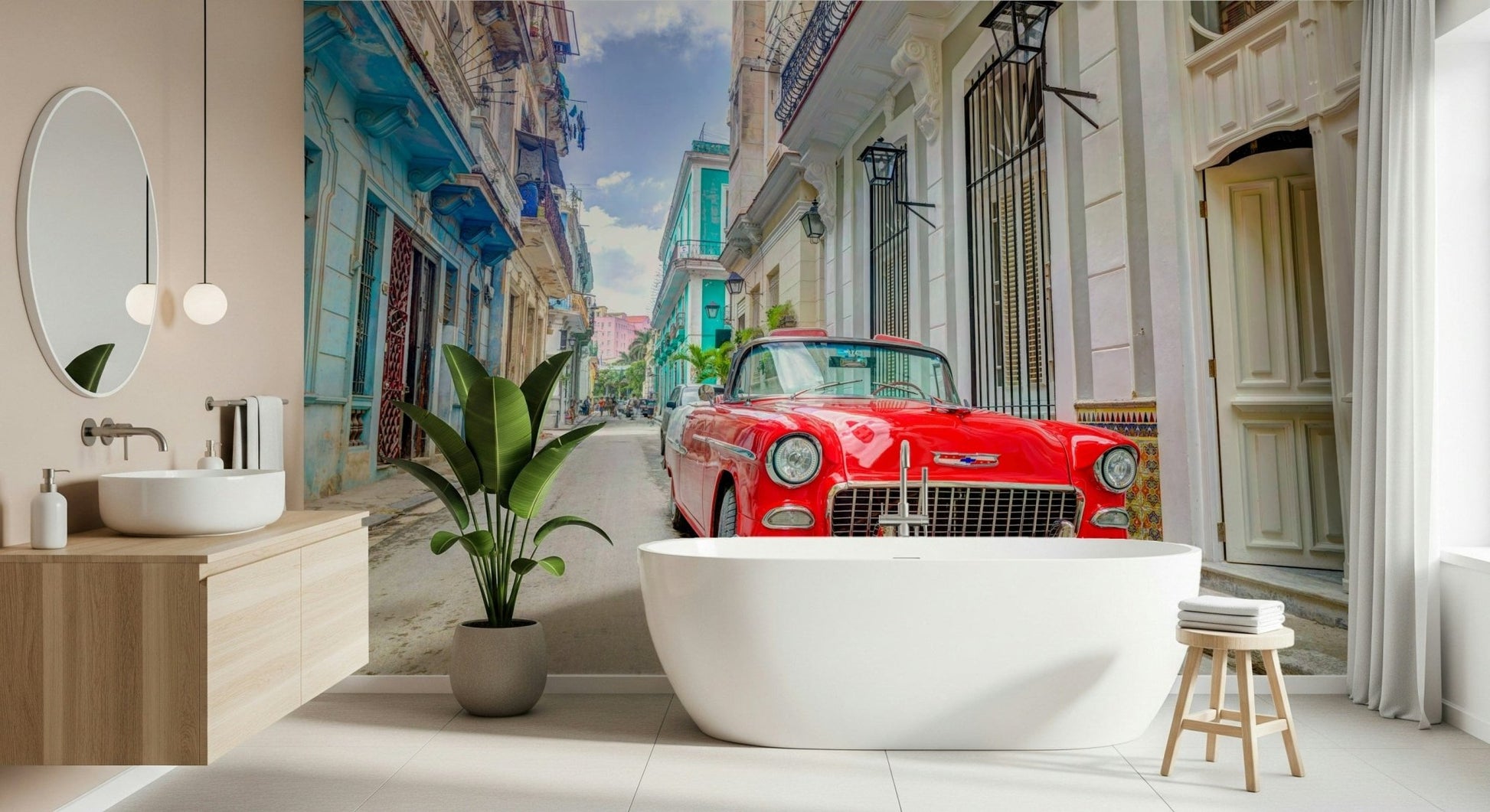Cuban Classics wallpaper mural of a red vintage car behind a freestanding white bathtub in a bathroom