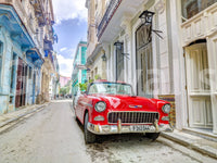 Cuban Classics shown as a full-wall mural, a red vintage convertible parked on a colourful Havana street